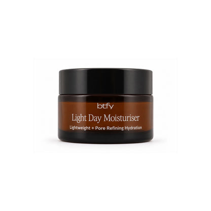 BTFY Light Day Moisturiser 30ml in an amber glass jar with a black lid for lightweight pore refining hydration