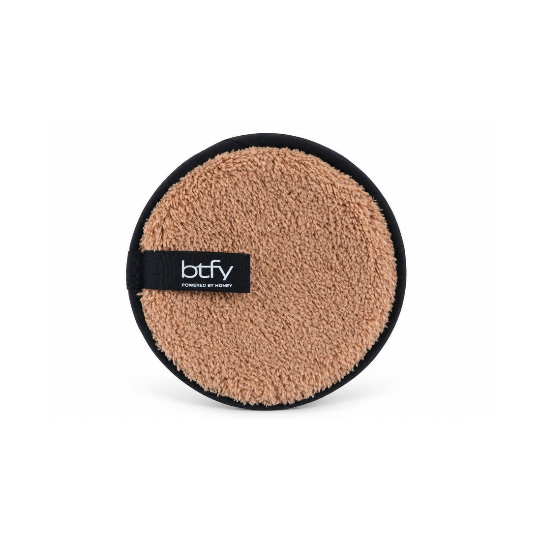 BTFY reusable Makeup Remover Puff, front view, round plush honey-coloured microfibre with a black BTFY Powered by Honey tab