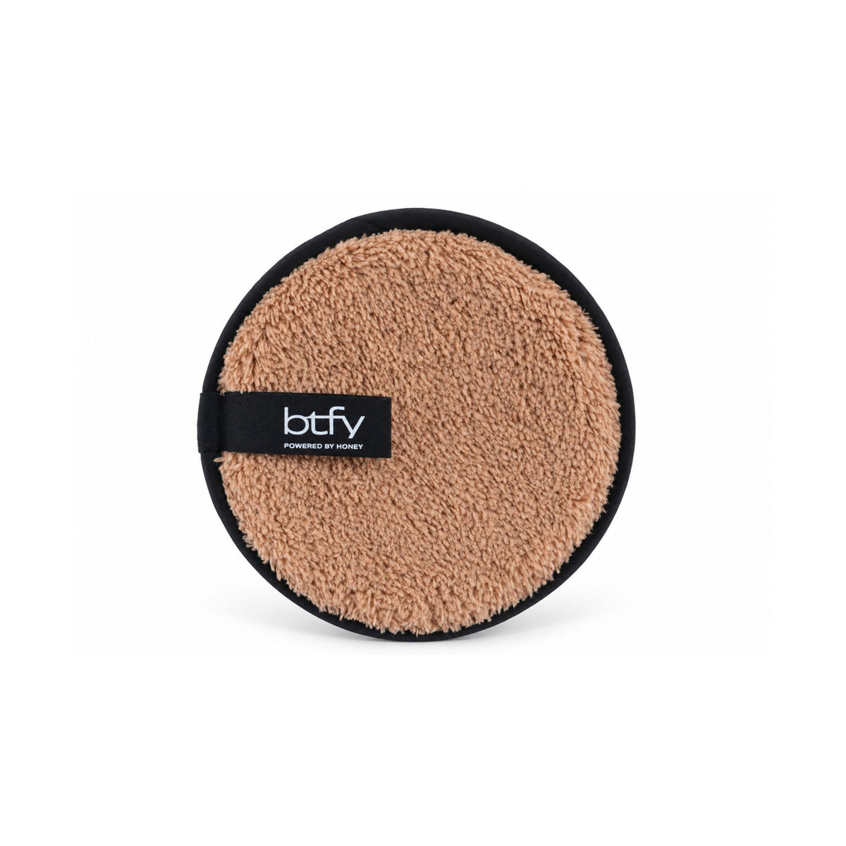 BTFY reusable Makeup Remover Puff, front view, round plush honey-coloured microfibre with a black BTFY Powered by Honey tab